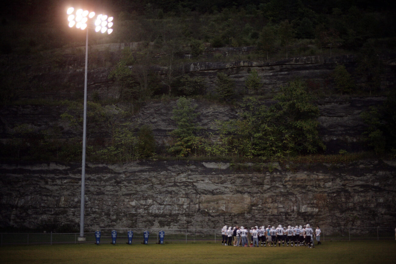 The Knott Central Patriots gather just off the field before playing the Pike County Central High School on Friday, Sept 18, 2009 in Pike county.