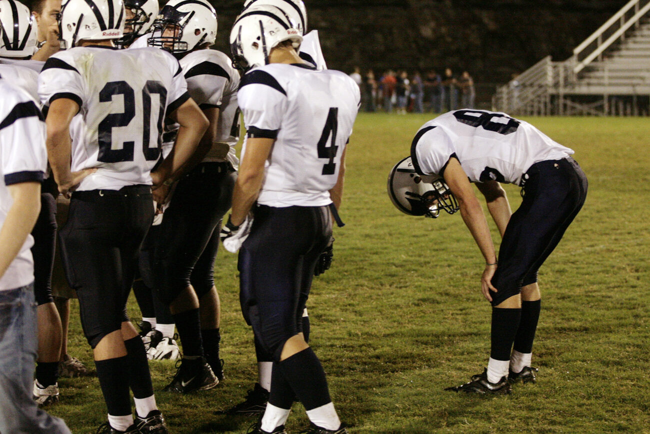 Senior running back Bo Herald rests before a huddle in the fist half of Knott County Central's game against Pike County Central on friday, Sept 18, 2009.