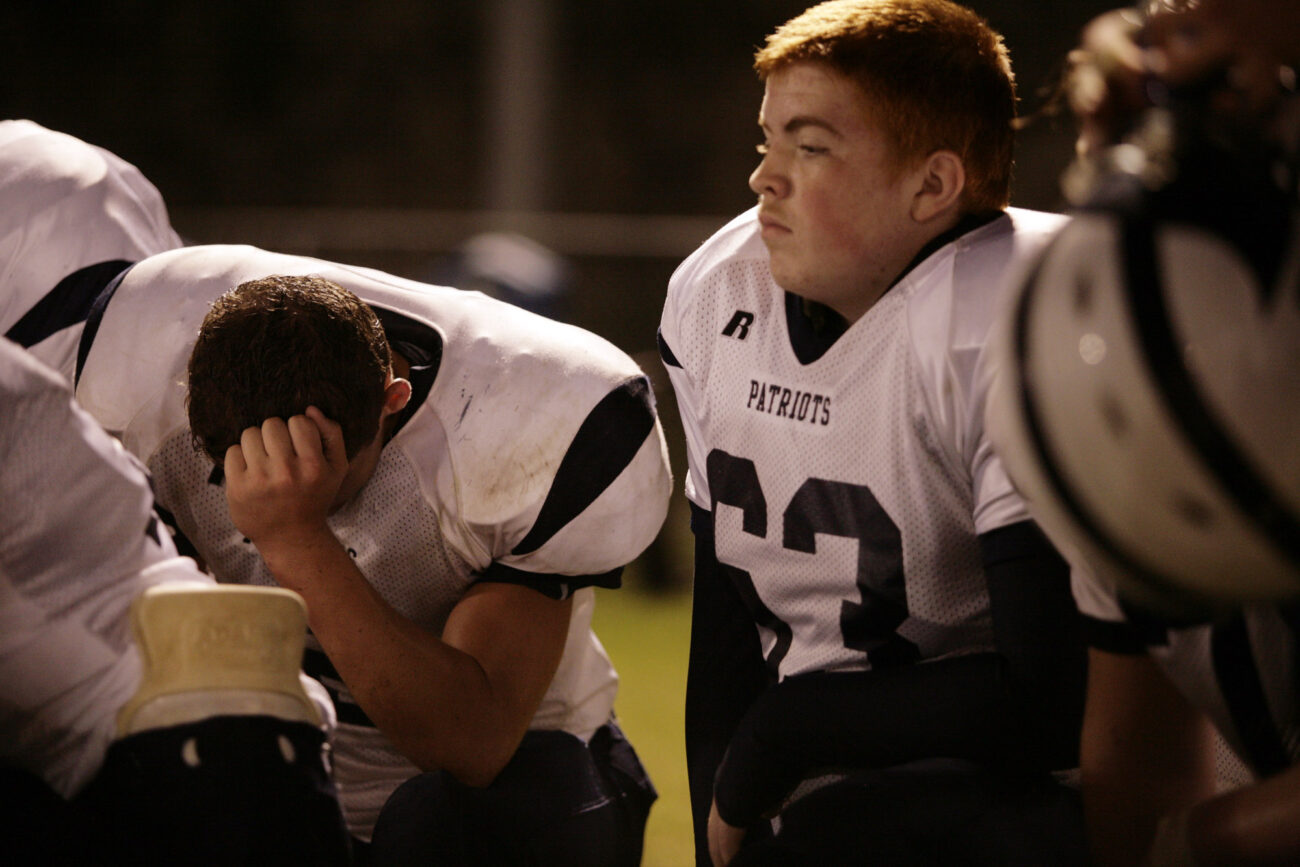 Sophomore running back Jared Waddles bows his head after losing to Pike County Central 46-19 on Friday, Sept. 18, 2009.