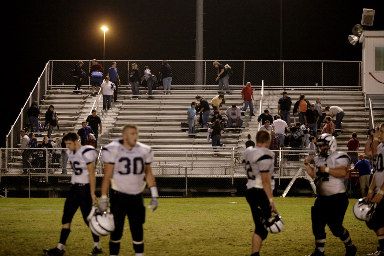 Knott County Central fans pack up to leave the stadium as players walk off the field following a 46-19 loss to Pike County Central on Friday, Sept 18, 2009.
