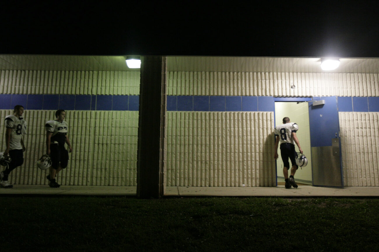 Jared Waddles, right, walks into the locker room at Pike County Central High School after losing 46-19 on Friday, Sept 18, 2009.