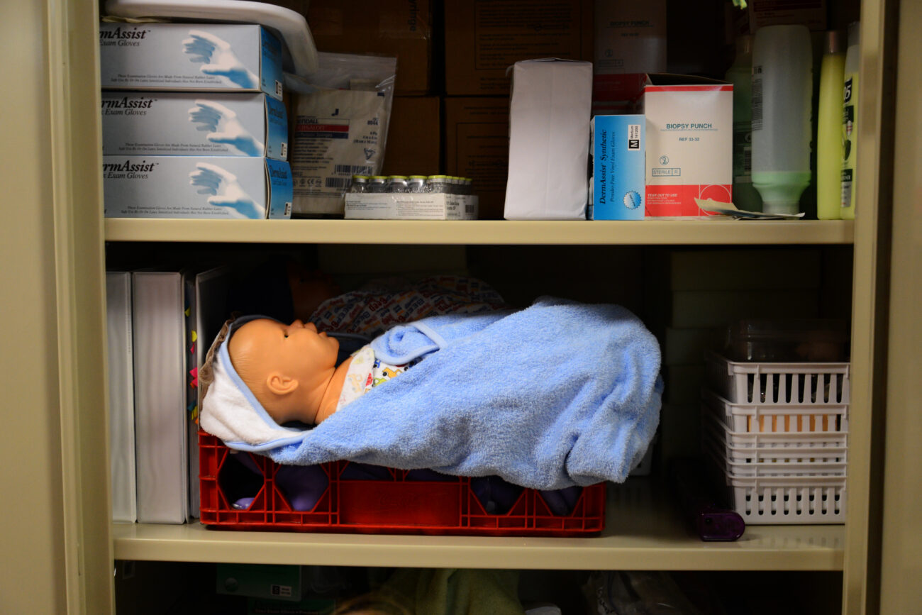 A baby mannequin is stored in a supply closet at the Frontier Nursing University in Hyden, Kentucky, on Friday October 11, 2013. Frontier Nursing University was founded in 1939. Photo by Eleanor Hasken