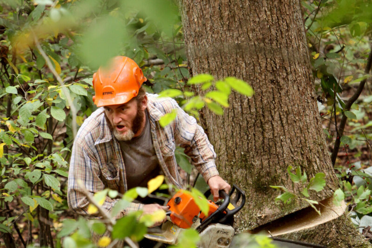 Randy Joe Thomas, 43, has suffered through many injuries as a logger. "I've had both my legs crushed, my nose broken, teeth knocked out and fingers smashed," said Thomas "but this is all I know." Thomas cut down his first tree at 12 years old. Photo by Nikolas Kolenich