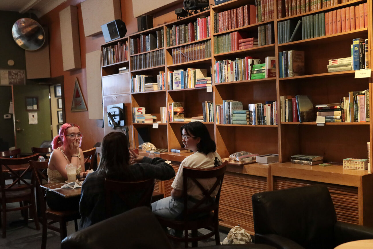 Bre Oliver, left, Riley Cecil, middle, and Tara Johnson have lunch at the Kentucky Coffee Tree, a partnering business to Poor Richard’s Books Thursday, Oct. 14, 2021.