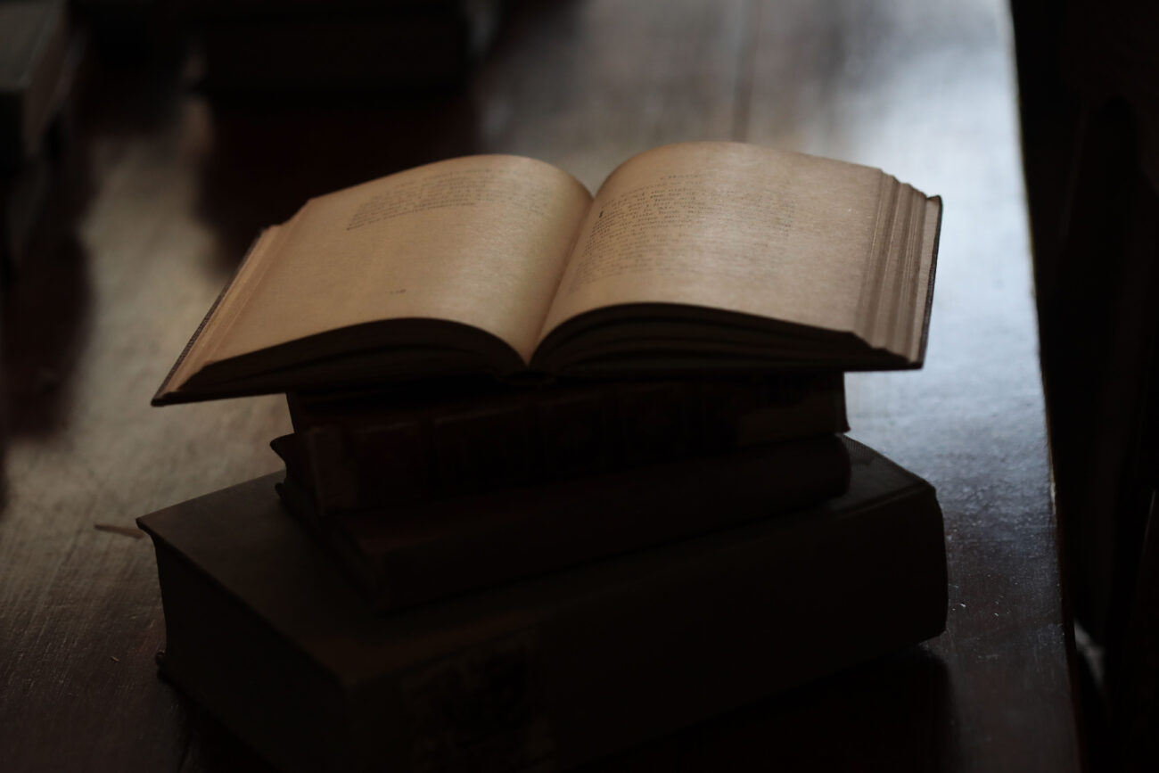 Light spills over a pile of books left by past readers in Poor Richard’s Attic Thursday, Oct. 14, 2021. The attic is part of Poor Richard’s Books in Frankfort.