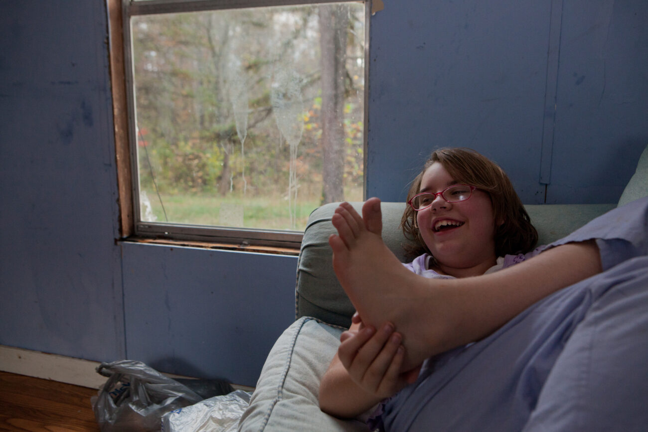 Christina Hall,11, enjoys her family's new trailer home after being homeless for two and a half months.