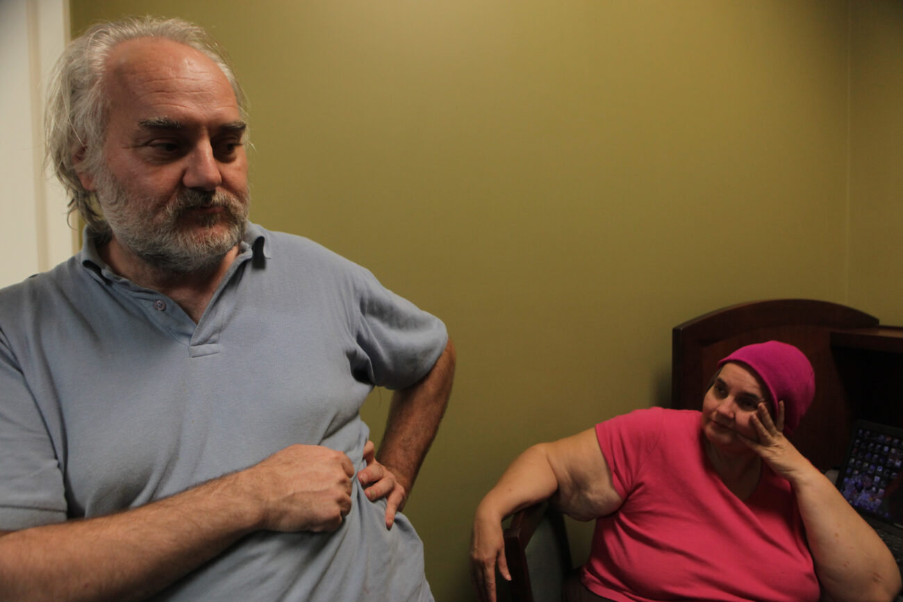 Joseph Hall, left, and his sister Donna Hall spend time at the Laurel County Public Library in London, KY, recharging their electronics and planning their future. Both have struggled with homelessness over the past summer and are trying to move in to a pair of trailers next to one another.
