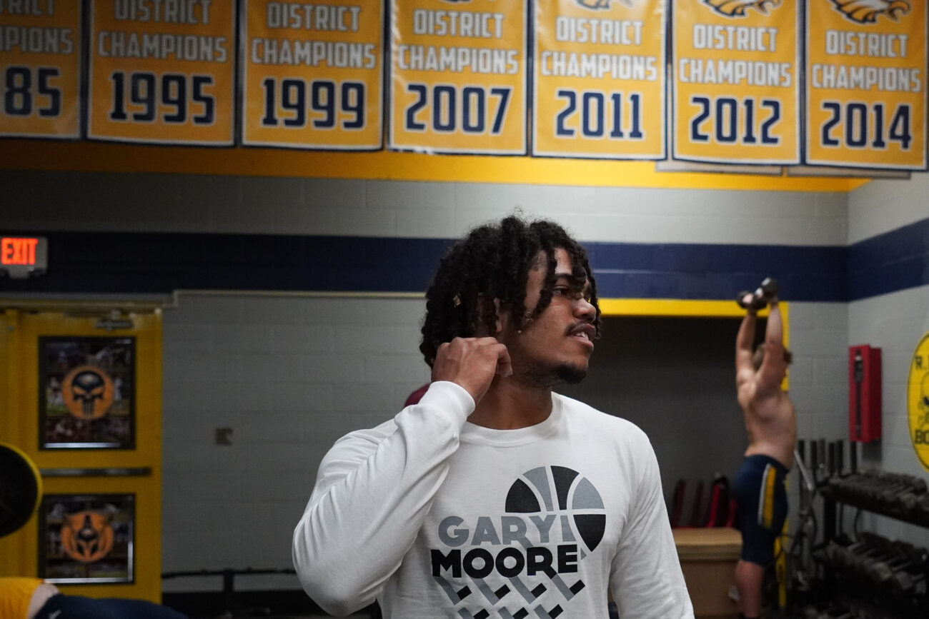 Kaden Moorman prepares to begin warmups before practice in the Franklin County High School weight room in Frankfort, Kentucky, Wednesday, Oct. 13, 2021.
