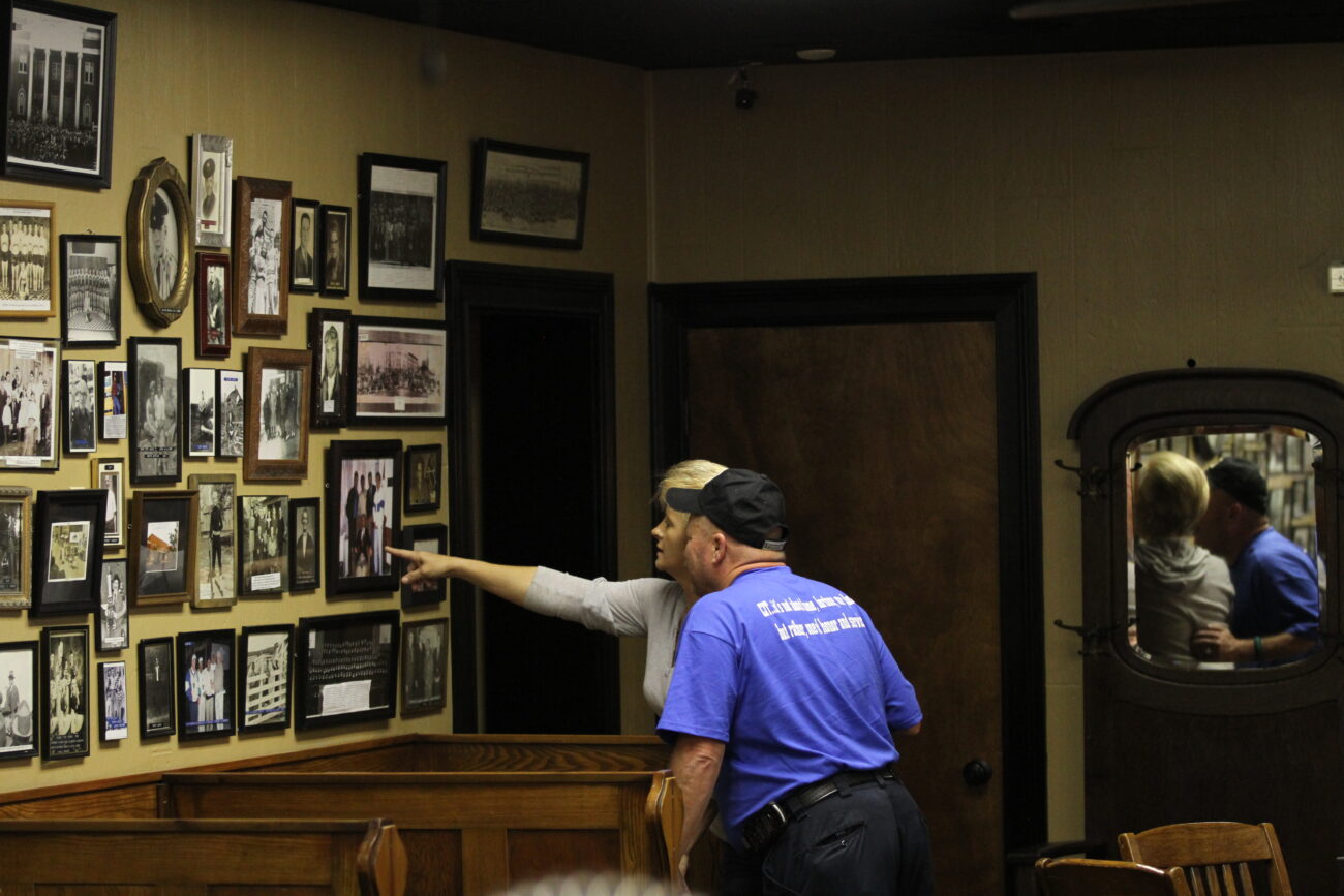 Jaxxon Wright and his wife Cherry Wright take a stroll down memory lane while they wait for their dinner. Photo by Alex Holt
