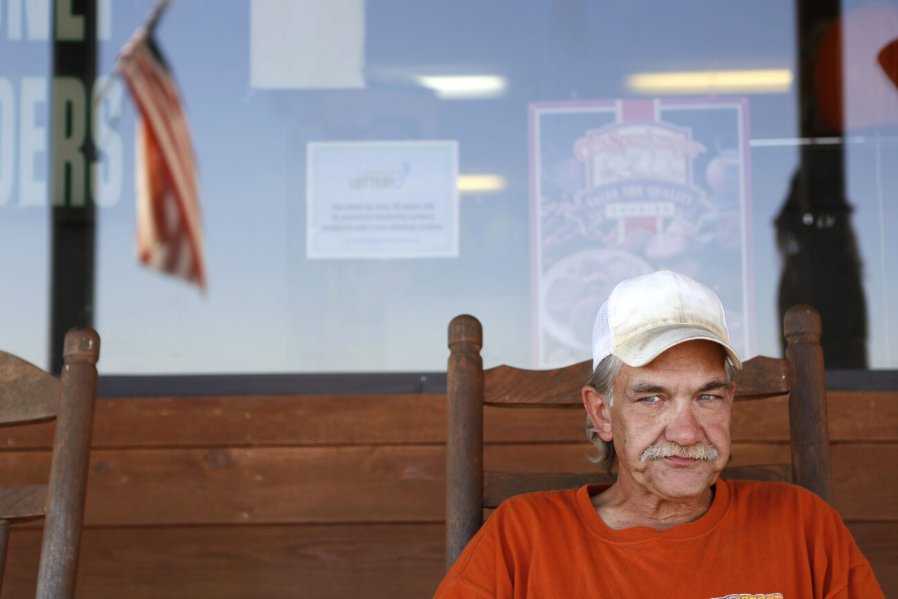 "Meds, Exercise diet and sleep. If I don't do all four of those things I get off track, " said Duane Firestone, 53. "If I don't take my meds I end up in a jail or hospital." Duane sits outside Ot's General Store in Laurel County, Kentucky, on October 24, 2012, looking to hitch a ride to a nearby town. ..Photo by Coty Giannelli