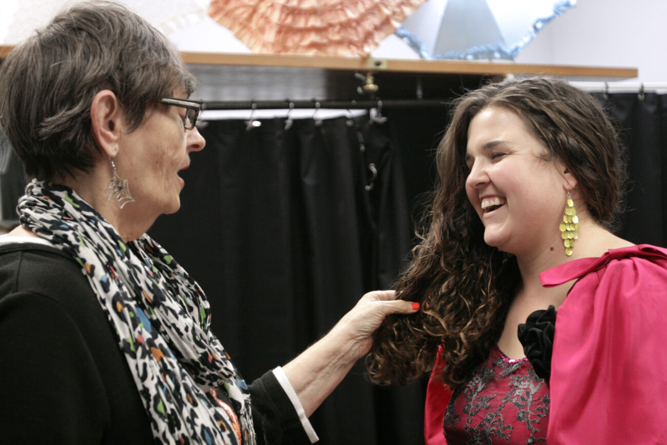 Joyce Loveless, previous owner of "Dress the Part Costume Shop" in London, Ky., gives styling tips to a customer on Thursday, Oct. 25, 2012. Loveless strives to make sure her costumes are true to the styles of the historical era from which they were inspired...Photo by Amelia Orwick