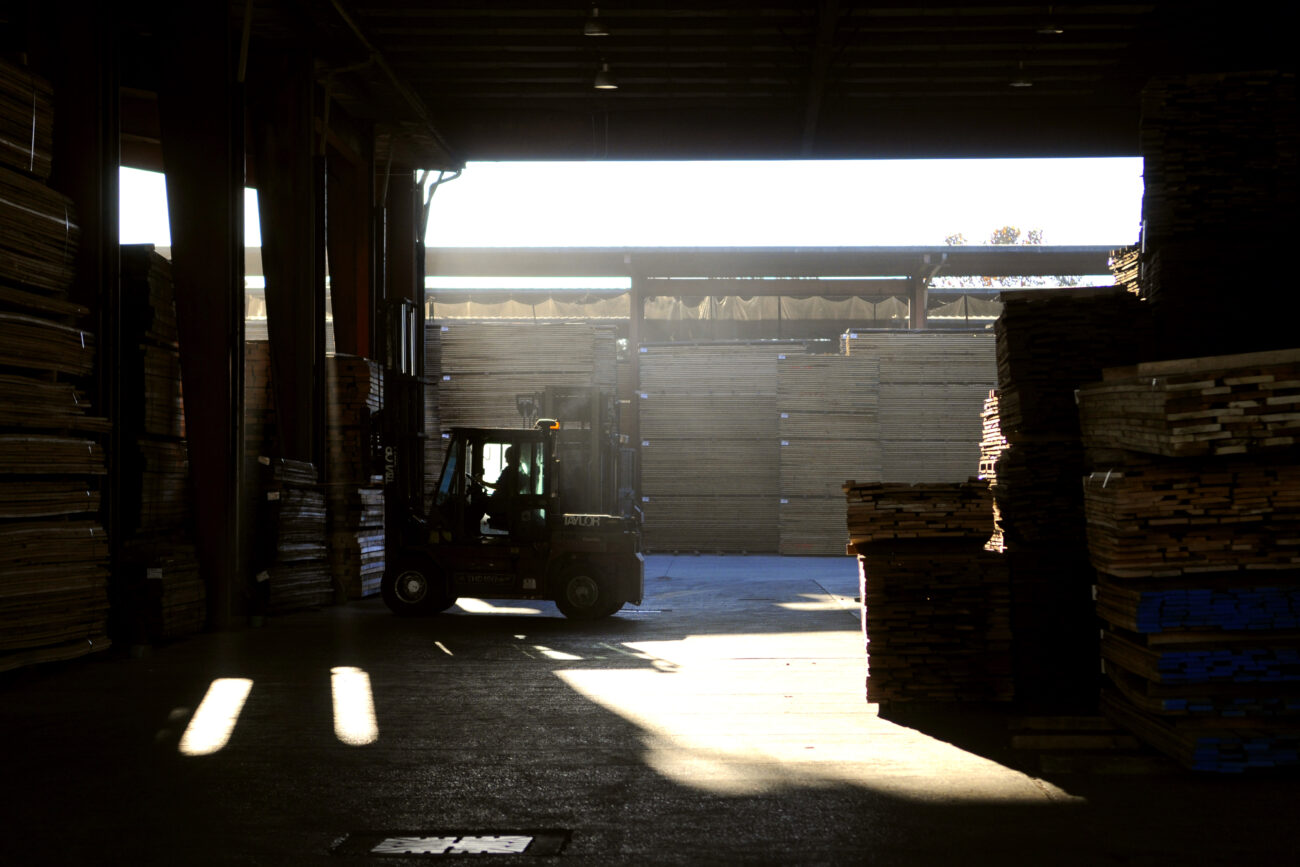 Forklift operator Ricky "Spanky" Smith, 45, retrieves a pack of drying lumber to be taken to the work line at Begley Lumber in London, KY, Thursday October 25, 2012.