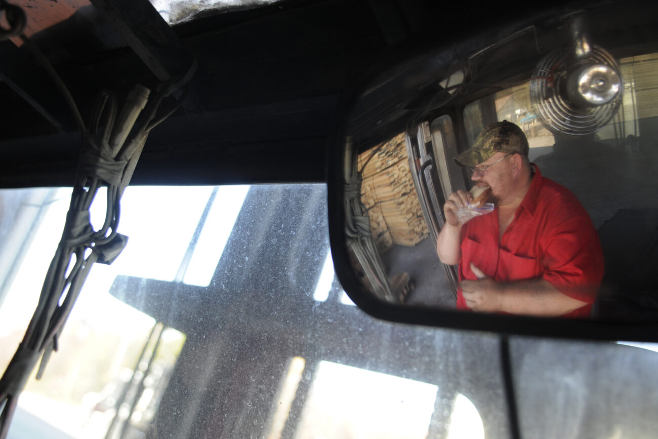 Jeff "Beaufort" Collins, 44, takes a lunch break Thursday afternoon, during his 10 hour shift at Begley Lumber. Beaufort has been working at Begley for over a decade.