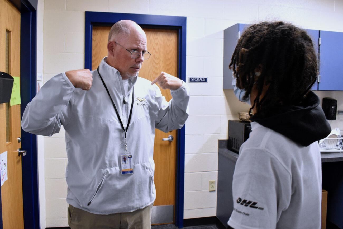 Principal Chris Tracy talks to student Davion Boesche about school struggles at Franklin County High School in Frankfort, Kentucky, on Friday, Oct. 15, 2021.