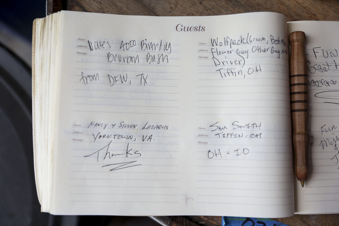 Name of customers fill a guestbook on Wednesday, Oct. 13, 2021, at Three Boys Farm Distillery in Franklin County, Kentucky. Photo by Jack Weaver