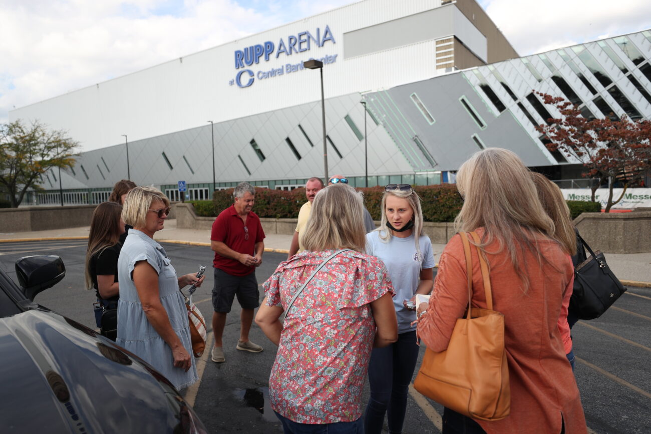 Cook hands out vendor credentials to her workers ahead of Big Blue Madness at Rupp Arena on Thursday, Oct. 14, 2021, in Lexington, Kentucky. Most of Cooks employees are family and friends.