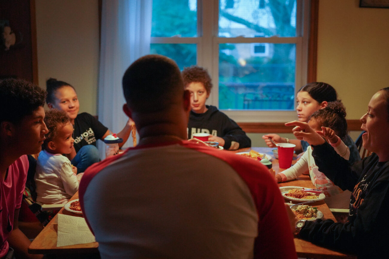 Ricky Redden and his family eats dinner and spends time together before he drives to work an event later that night on Friday, Oct. 15, 2021 in Frankfort, Kentucky.