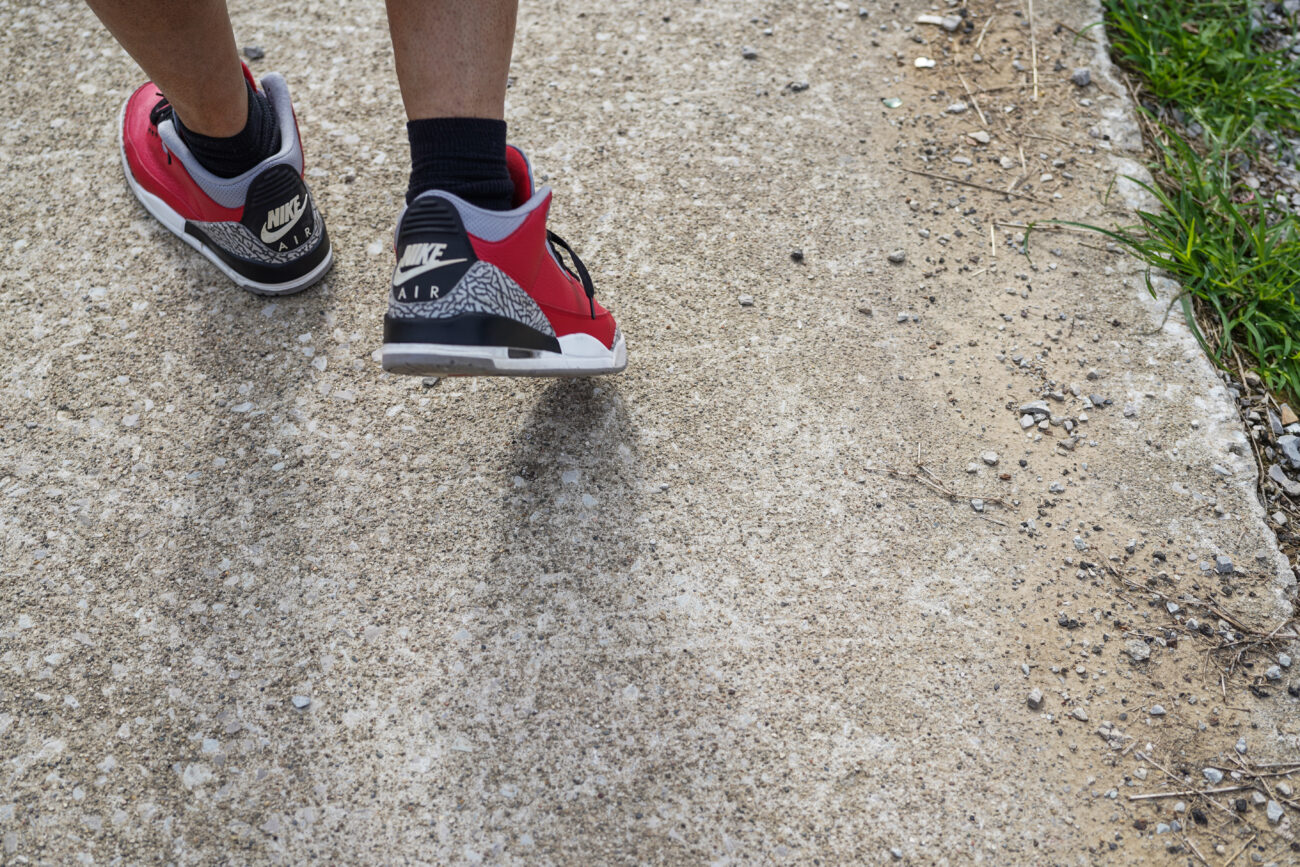Ricky Redden walks the streets of the community he wants to change in Frankfort, Kentucky, on Thursday Oct. 14, 2021.