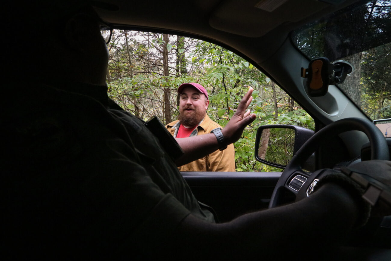 James Brace, left, waves to Joshua Hawkins, right, at the Kleber Wildlife Management Area on Friday, Oct. 15, 2021, in Frankfort, Kentucky. Brace said Franklin County is filled with “good people.”