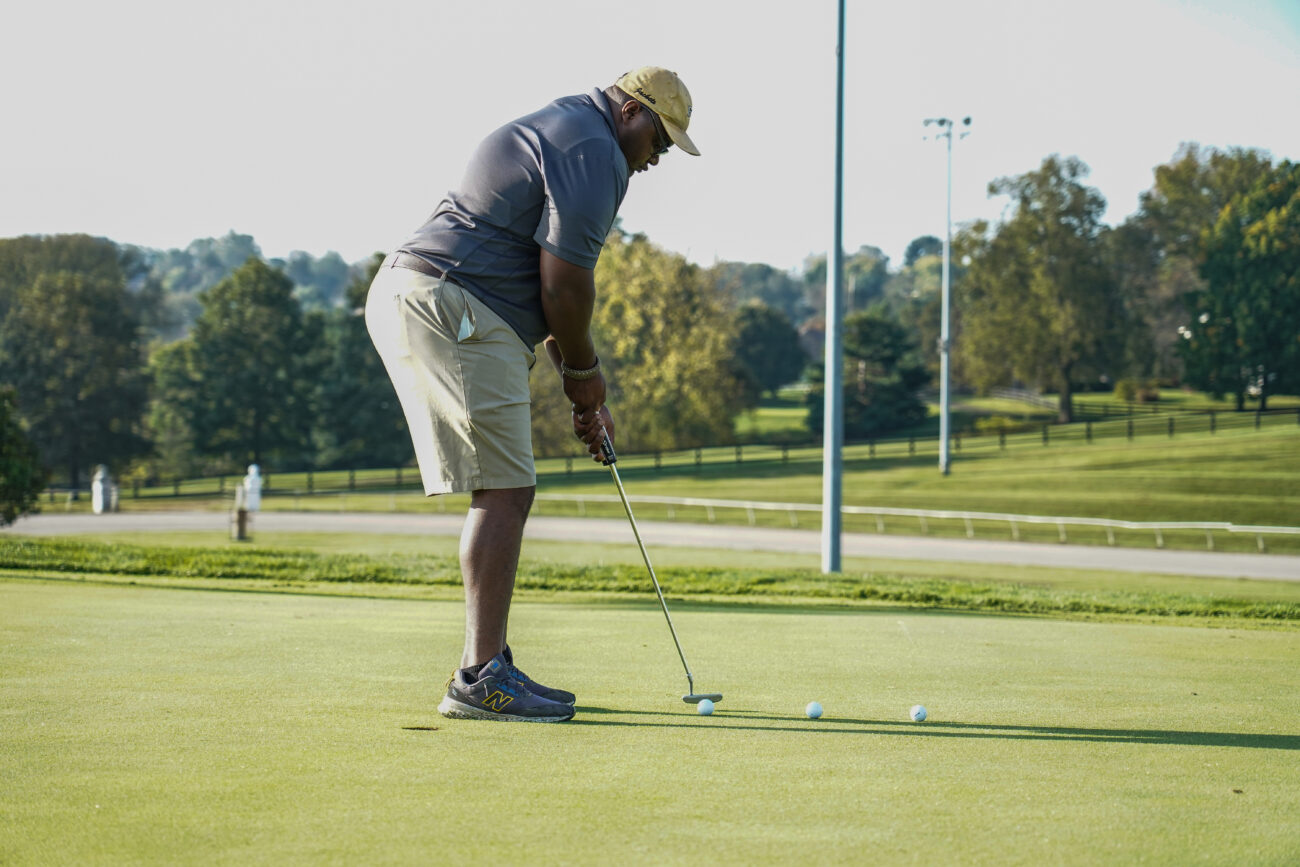 James Brace lines up a putt at the Lakeview Golf Course on Thursday, Oct. 14, 2021, in Frankfort, Kentucky. Brace was on the Kentucky State University golf team while he attended school there, and he enjoys keeping up his golfing skills on his days off work.