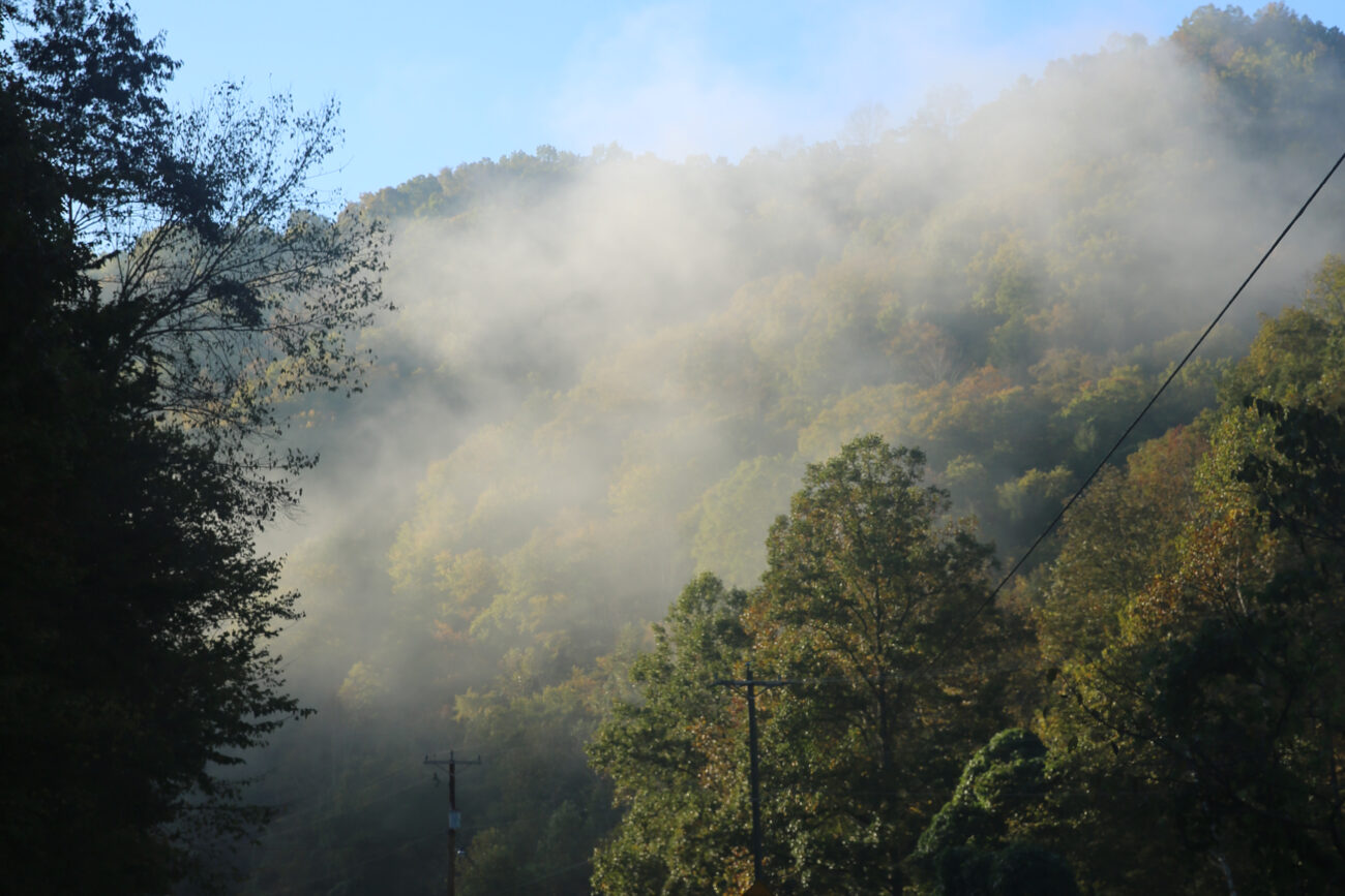 Morning fog disappears over the top of the mountain on I-80 in Hyden , Ky., on Saturday, October, 12, 2013. Photo by Rachel Walker