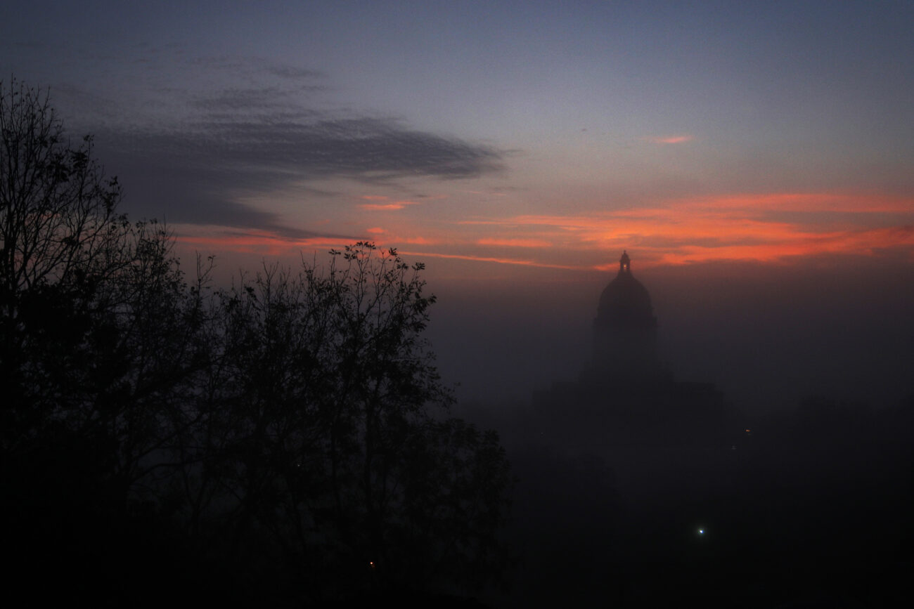 The sun rises through the early fog in Frankfort, Ky. on Thursday, Oct. 14, 2021 (Photo by Martha McHaney).