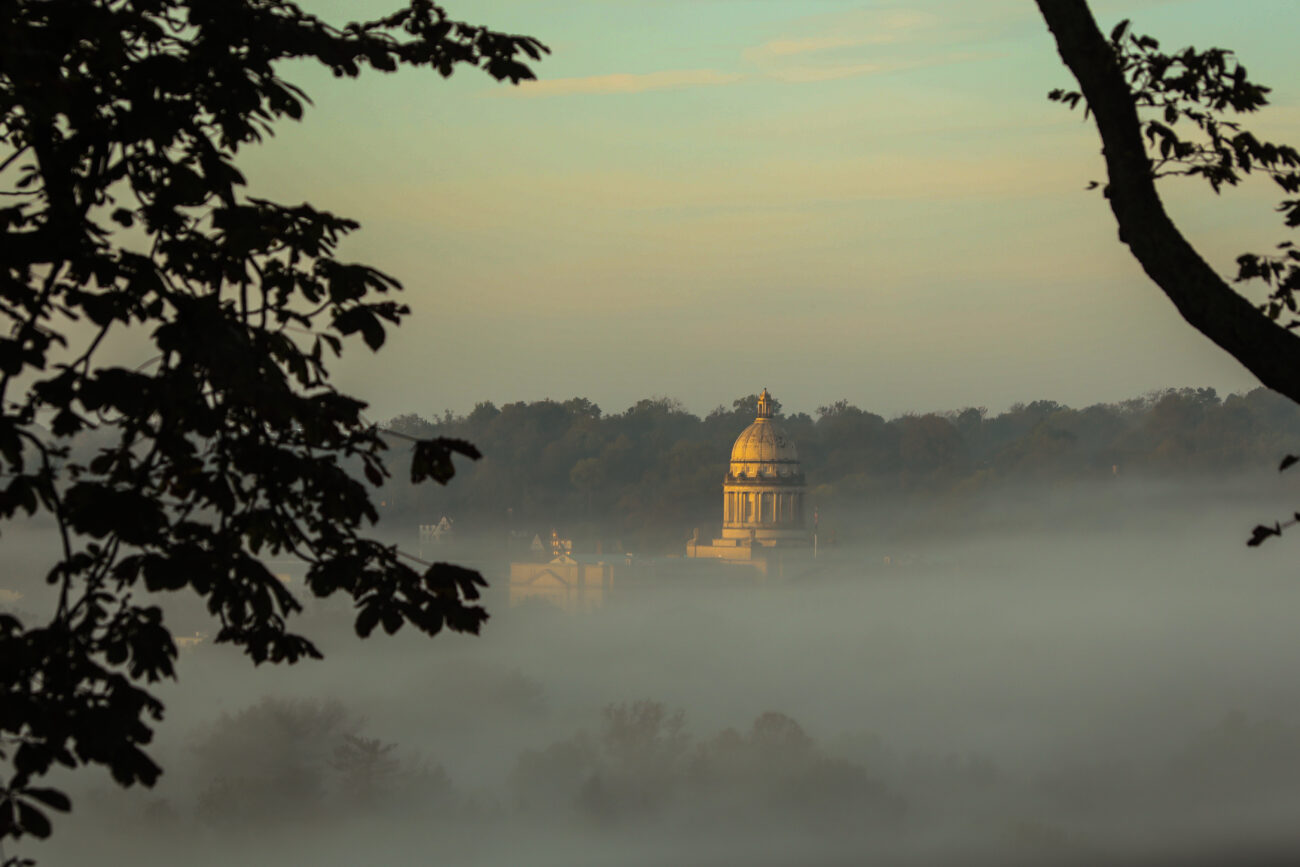 The Kentucky State Capitol dome breaks through the morning fog in Frankfort, Ky. on Thursday, Oct. 14, 2021 (Photo by Martha McHaney).
