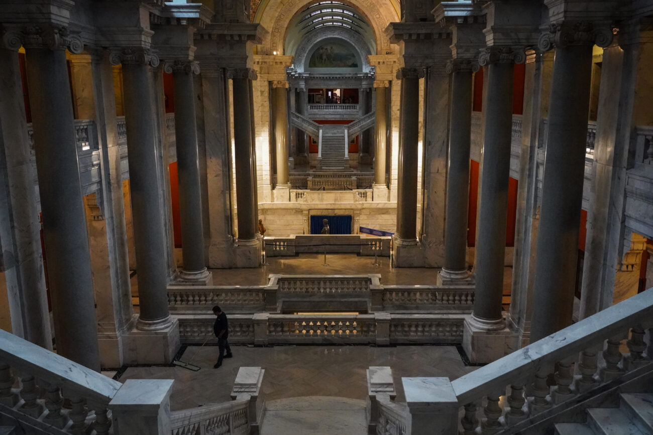 A capitol janitor sweeps the marble floors 20 minutes before they close for the weekend in Frankfort, Ky. on Friday, Oct. 15, 2021 (Photo by Martha McHaney).