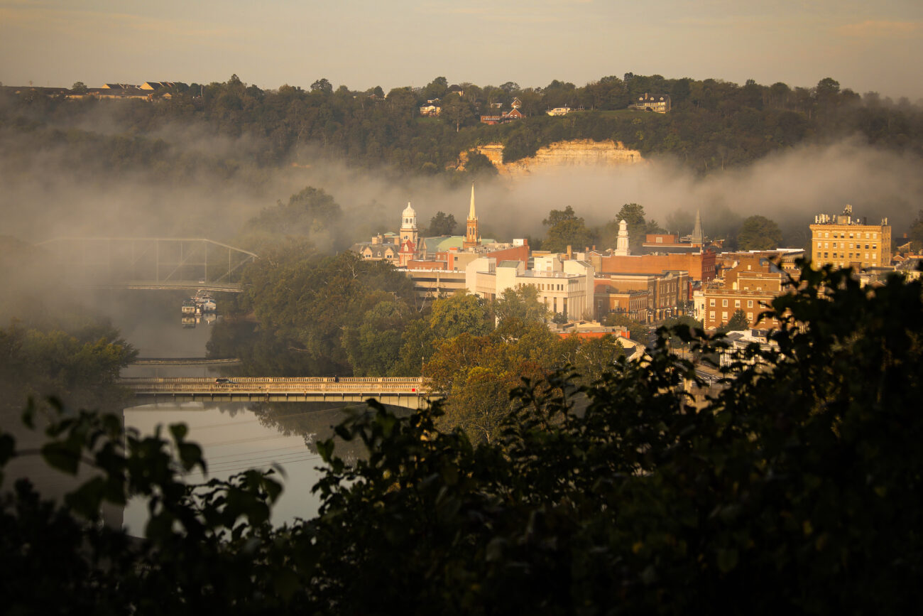 Downtown Frankfort peaks through the looming fog in Frankfort, Ky. on Thursday, Oct. 14, 2021 (Photo by Martha McHaney).