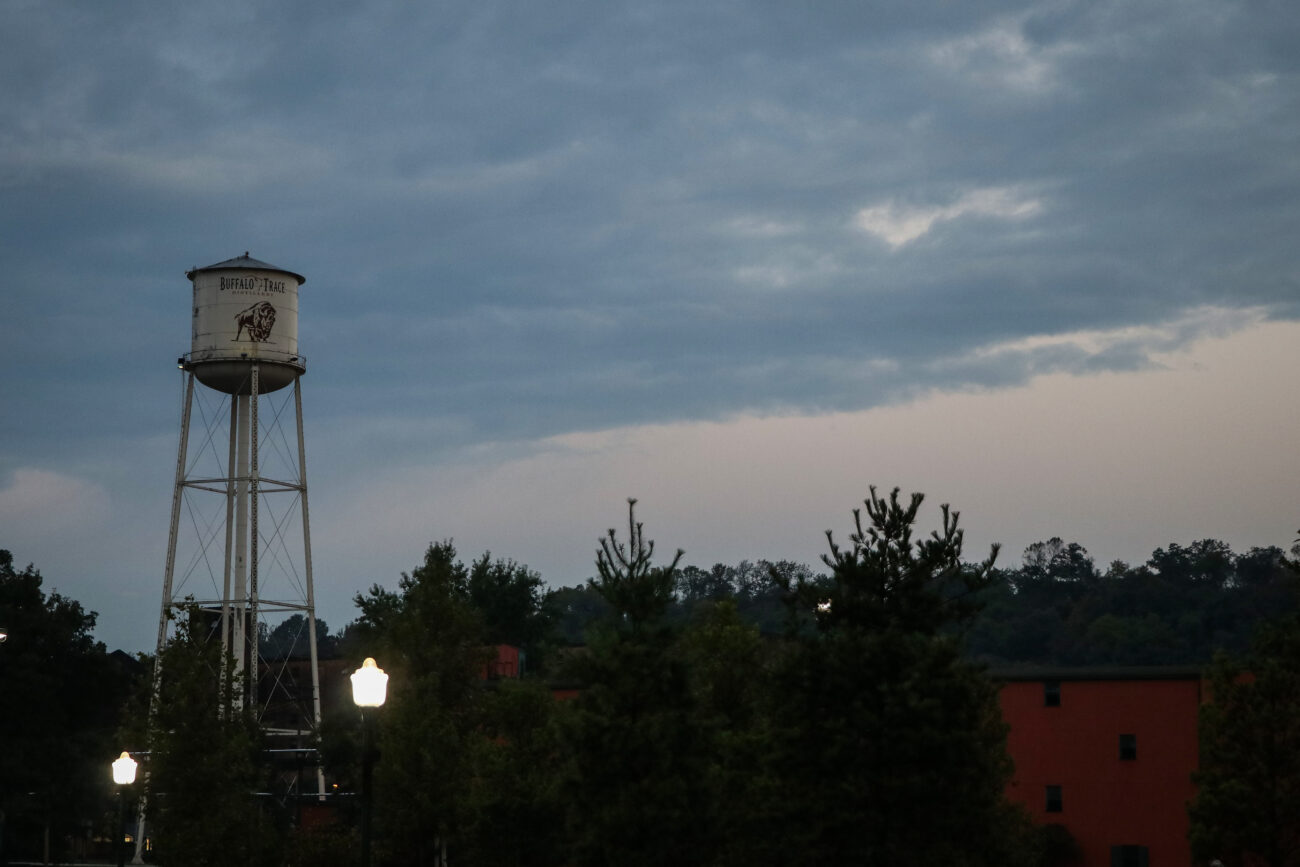 The early morning sky illuminates a water tower at the Buffalo Trace Distillery on Friday, Oct. 15, 2021, in Frankfort, Kentucky.