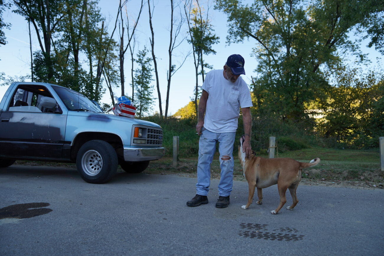 Charles Divine and his dog Buster search the river for litter and trash in order to keep the community clean in Frankfort Ky. on Wednesday, Oct. 5, 2022. “If there’s trash, no one’d ever come here,” Divine said. Photo by Carter Skaggs