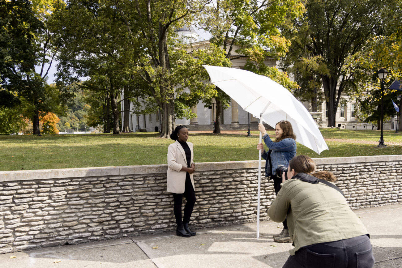 Katima Smith-Willis poses for a portrait for Protect Kentucky Access with photographer Betsy Hansen and campaign manager Rachel Sweet in downtown Frankfort, Kentucky on Friday, Oct. 7, 2022. Photo by Martha McHaney.