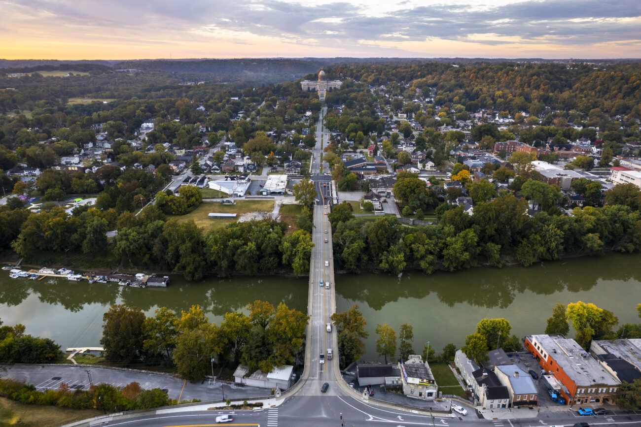 The sun sets behind the Kentucky State Capitol in Frankfort, Kentucky, on Thursday, Oct. 6, 2022. Photo by Jack Weaver.