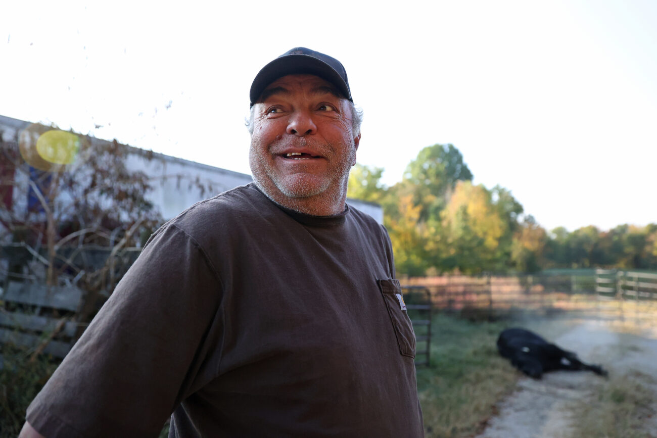 Hank Schweickart jokes with Rex Burkhead after Burkheads bullet misses the cow at Jerry Hughes farm in Frankfort, Kentucky, on Thursday, Oct. 6, 2022. Photo by Abbey Cutrer.