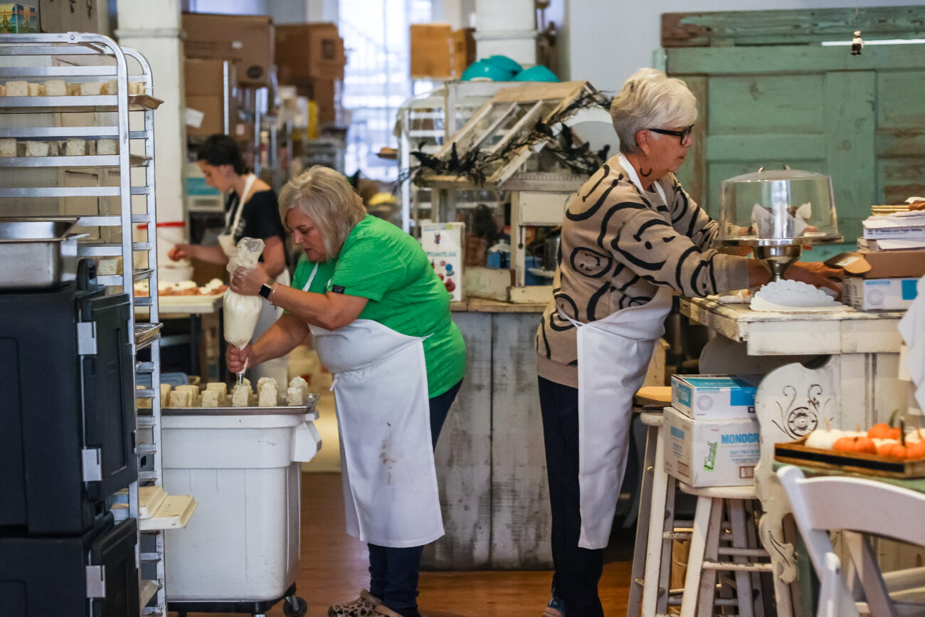 Owner, Beth Greenwell Carter along with her employees Sandy and Kassi set up treats for B’s Bakery in Frankfort KY, on Oct 8, 2022.
