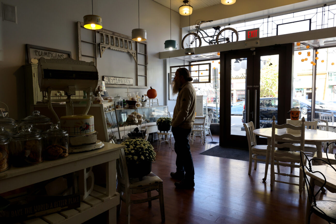 On Oct. 7, 2022 a customer is looking at the array of teats presented in B’s Bakery in Frankfort KY.